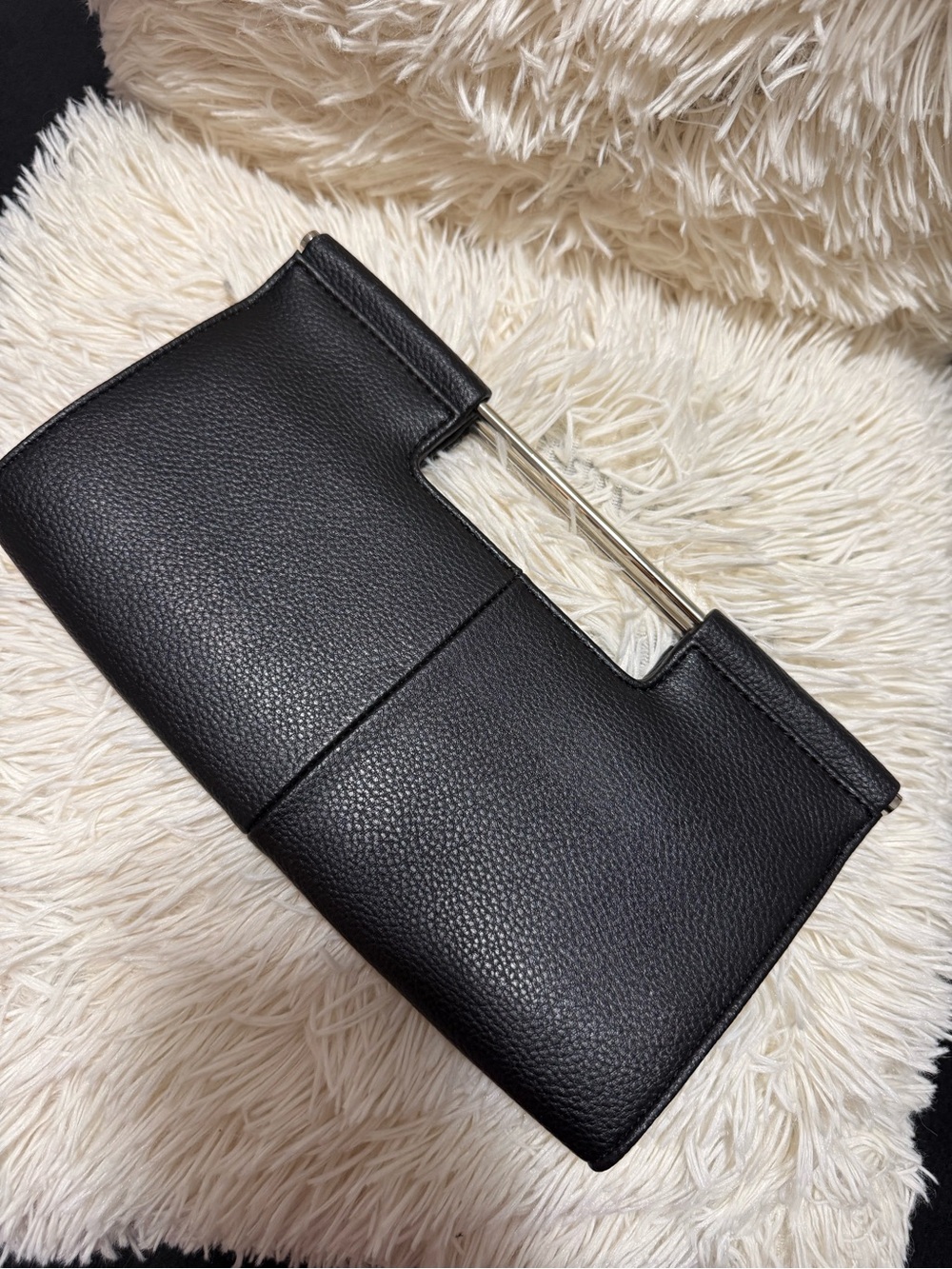 The Limited Black Textured Leatherette Clutch with Metal Handle